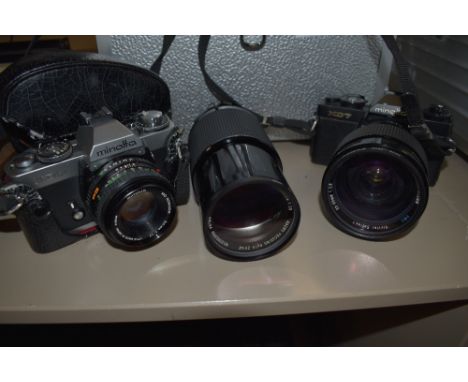 A Minolta XD5 camera, a Minolta XD7 camera, a Rokkor 50mm lens, a Vivitar 70-100mm lens, a Vivitar 35-85mm lens, a light mete