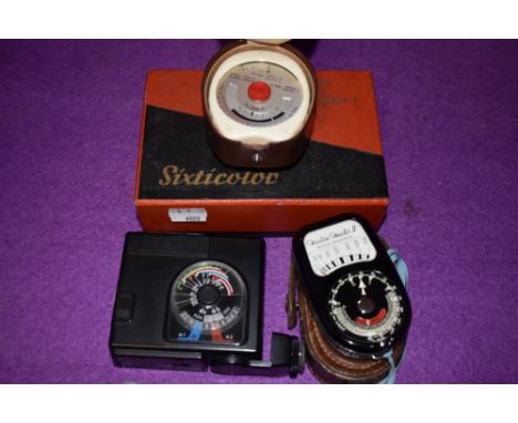 Two Light meters and a Nikon Speedlight Flash with light meter. A Weston Master II and  Gossen Sixticolor light meters