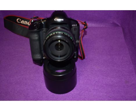 A Canon EOS 1 camera body with Canon EF 70-300mm f4,5-5,6 DO IS USM lens in Canon soft carry
Condition Report. Good clean con