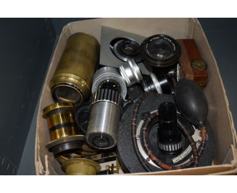 A box of various lenses and camera parts
approx 22 lenses