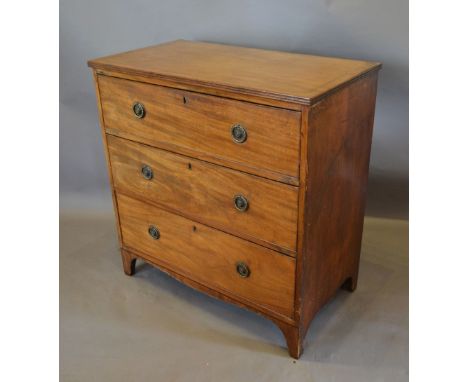 A 19th Century Mahogany Small Straight Front Chest, the reeded top above three drawers with a shaped apron raised upon bracke