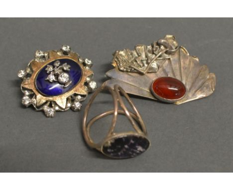 A Silver and Blue Enamel Paste Set Brooch, together with another similar brooch and a silver scarf ring