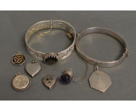 A Scottish Silver Bracelet of Pierced Form set with a large brown stone, claw set, together with a Scottish pendant in the fo