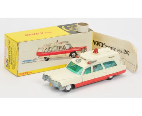 Dinky Toys 267 Superior Cadillac "Ambulance" Two-tone off white and red including battery operated roof light, green tinted w