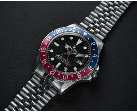 A RARE GENTLEMAN'S STAINLESS STEEL ROLEX OYSTER PERPETUAL GMT MASTER "PINK PANTHER" BRACELET WATCHCIRCA 1978, REF. 1675Moveme