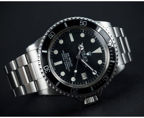 A RARE GENTLEMAN'S STAINLESS STEEL ROLEX OYSTER PERPETUAL DATE "GREAT WHITE" SEA DWELLER BRACELET WATCHCIRCA 1979, REF. 1665 