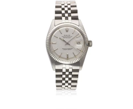 A GENTLEMAN'S STEEL & WHITE GOLD ROLEX OYSTER PERPETUAL DATEJUST BRACELET WATCHCIRCA 1977, REF. 1601 WITH "LINEN" DIALMovemen