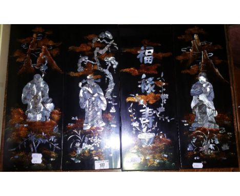 A Good Set of Four Ebonised and Mother of Pearl Plaques, along with four pieces of treen to include a pair of candlesticks (8