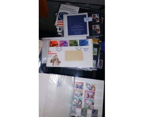 A Collection of Stamps & First Day Covers to include a small album.