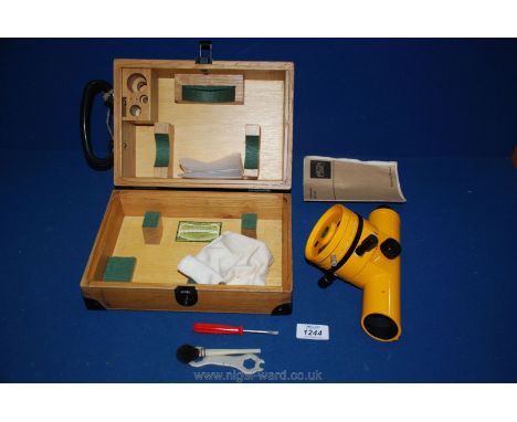 An NI 050 Automatic Builder's Level with instruction manual, in wooden box, keys present.