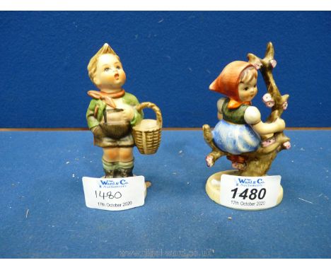 A Hummel figure of a Girl sitting on a branch and a young Boy with a basket.