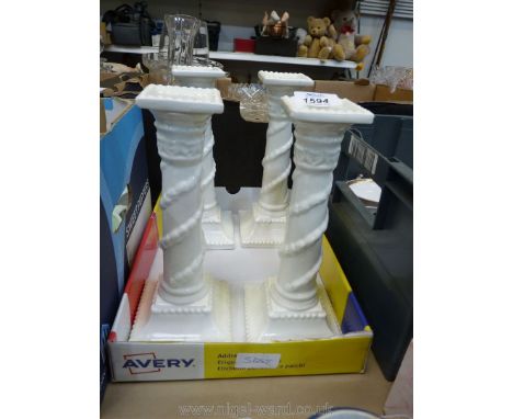 Four Spanish ceramic candlesticks in Greek column design.