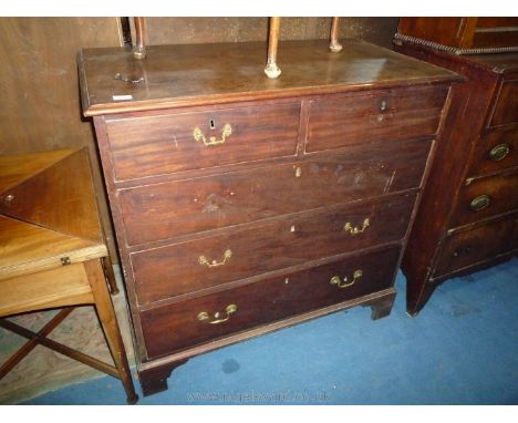 A Georgian Mahogany Chest of Drawers with brass swan-neck handles, standing on bracket feet with brass handles. 41 1/4"  wide