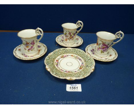 A very rare Meissen reticulated and floral painted small dish c. 1900 and a set of three Dresden coffee cans and saucers, ear