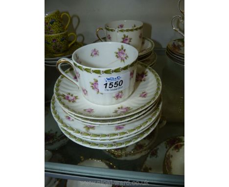 A small quantity of Theodore Haviland, Limoges, teaware;  two cups (both cracked), six saucers and five tea plates in pink ro