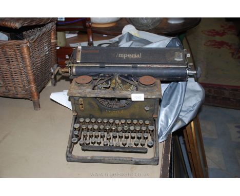 An Imperial typewriter a/f. and cover.