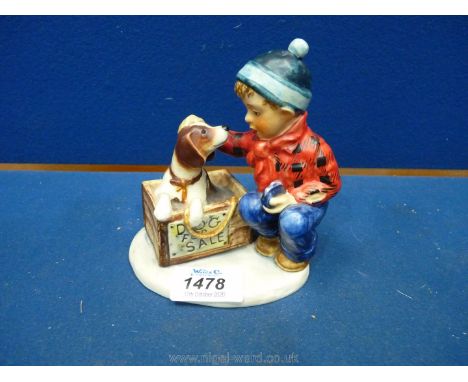 A Hummel figure of a young boy and his ''Dog for sale'' by Norman Rockwell