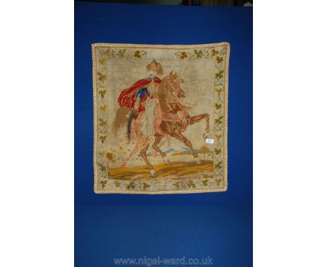 A wall hanging Tapestry depicting a soldier on horseback, worked by "Emma Jane Tromans 1863", 28 1/2" x 26" wide.