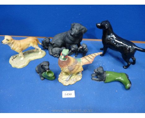 Miscellaneous Labrador figures including two pups playing with green wellies, a Leonardo black bitch with her four puppies, a