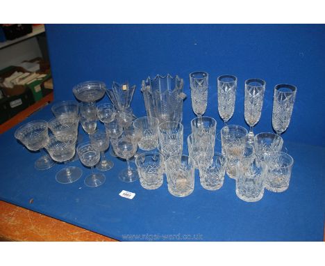 A Nachtmann German vase, ice bucket, Champagne flutes, three Champagne saucers, Sherry glasses, etc.