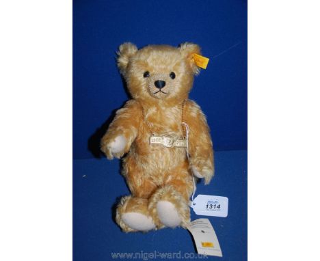 A Steiff Teddy Bear, 1902-2002 100 years anniversary, nos. 660337, 12'' tall, with growler  