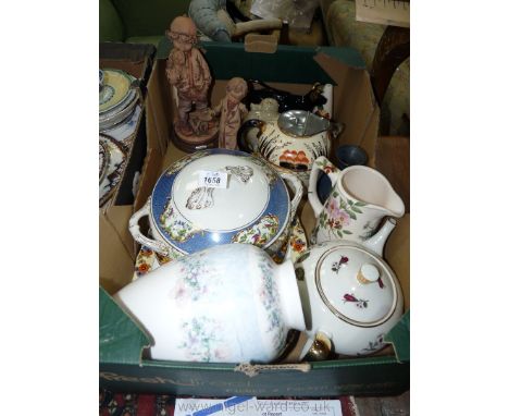 A quantity of china including teapot, vegetable dish, oval platter, figurines, creamer, vase etc.