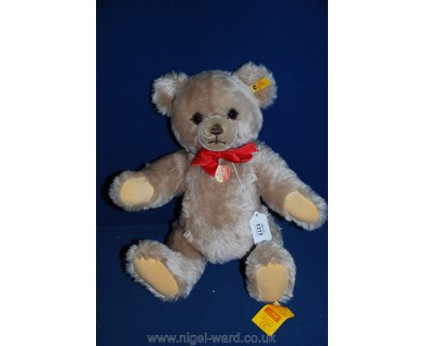 A Steiff Teddy Bear, 18'' tall, with growler, (original price tag £104)