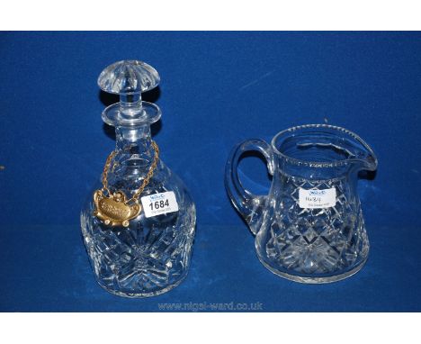 A Webb Corbett decanter and unmarked cut glass water Jug