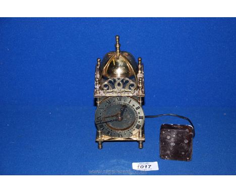 A Smiths battery mantle clock in brass with domed top and gallery, Roman numerals and Bakelite Sectric clock connector, 7" ta