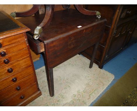 A 19th Century mahogany Pembroke table with single drawer on reeded bevelled legs with roller casters. 28" high x 30" x 20" o