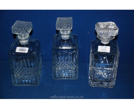 A pair of matching square glass Decanters plus another square Decanter engraved 'to Ernie from the Skittles team'.