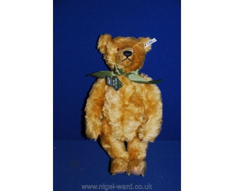 A boxed Steiff Centenary musical Bear created by Danbury Mint, made of mohair, 16'' tall, in Harrod's original box, with gree