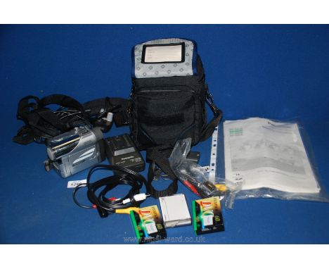 A Panasonic NV-GS3B Mini DV compact Digital Video Camera with 2 batteries, charger, infra red remote, cable remote, instructi