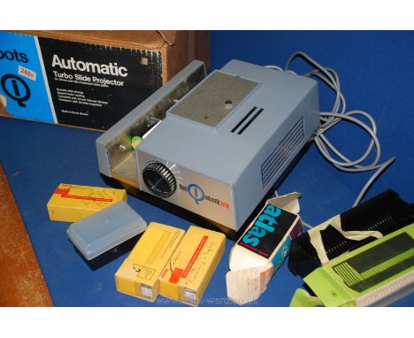 An automatic turbo slide projector for 35 mm &amp; 126 mm slides, with slides and slide trays.