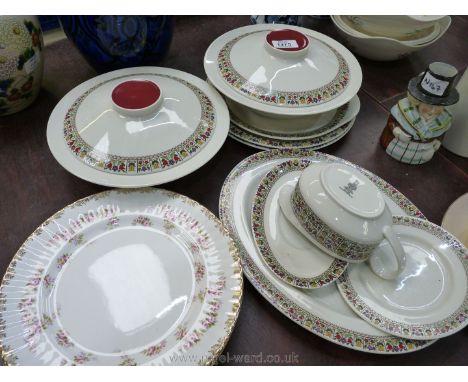 A Royal Doulton part Dinner service in ''Fireglow'' pattern including  meat plate, gravy boat and saucer, two dinner plates, 