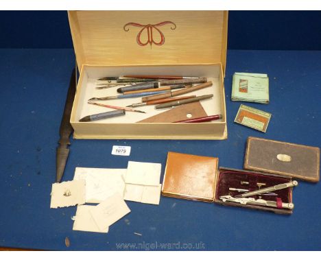 A Waverley box and contents including pens, crayons, letter openers, boxed geometry set, leather card case etc.