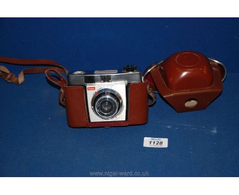 A Kodak Colorsnap 35mm camera with original case.