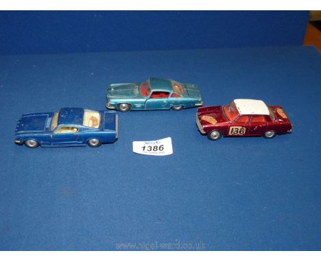 Three collectable Corgi Toys toy motor cars including "Ghia L6.4 " with Chryster V8 engine, in metallic blue, complete with l