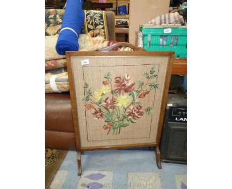 An embroidered fire screen. 32 1/2" x 22".
