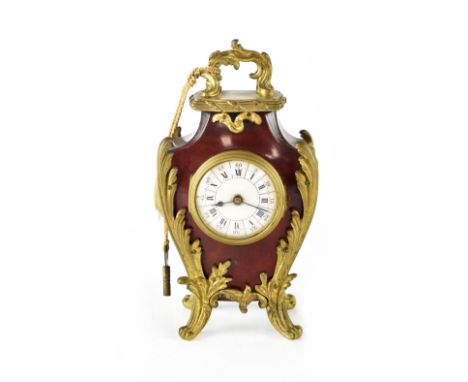 An Etienne Maxant, Paris boule mantel clock with gilt metal mounts, the enamelled dial set with Roman and Arabic numerals, th