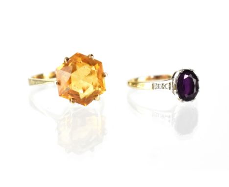 A 9ct yellow gold ladies' dress ring set with large citrine, size S and a 9ct yellow gold and platinum ring set with amethyst