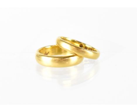 Two 22ct gold wedding band rings, size I and K, combined approx 9.1g (2). CONDITION REPORT Both hallmarked.  one ring dates r