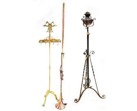 A quantity of brass and metal ware to include an iron and brass standard oil lamp, height 144cm, a floor-standing fire iron s