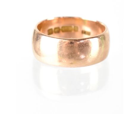 A gentlemen's 9ct gold band ring, size P/O, approx 6.95g. CONDITION REPORT Hallmarked.