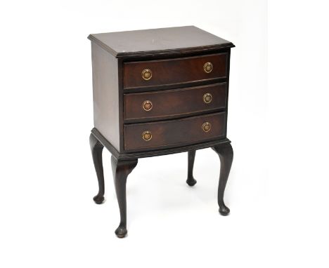 A small reproduction bow-fronted three-drawer bedside chest raised on cabriole legs, height 69cm, width 45cm, depth 35cm. CON