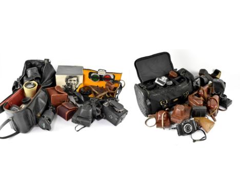 A large quantity of cased and uncased cameras and photographic equipment to include a Reflexa camera, Siluet.Elektra, K Regul