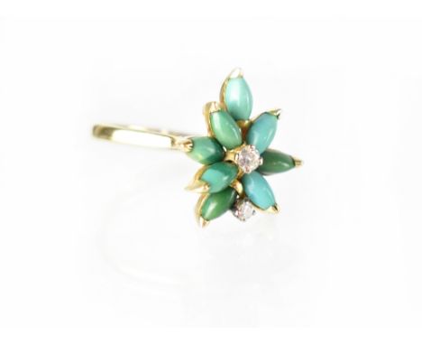 An 18ct yellow gold ring set with turquoise and diamonds, size R, approx 5.3g.