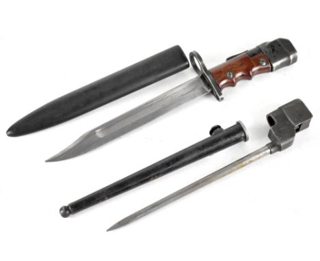 An Enfield No7 blade bayonet with metal scabbard, overall length 33cm and an Enfield No4 spike bayonet in metal scabbard, ove