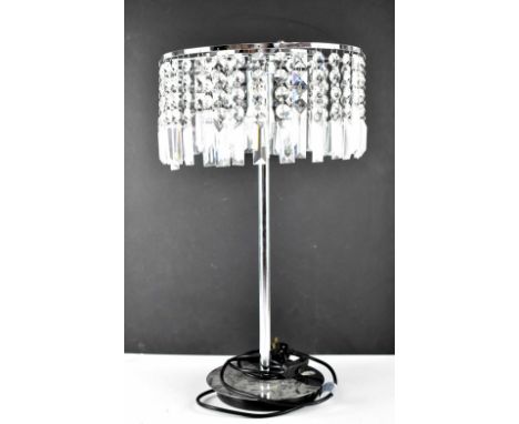 A modern table lamp with cut glass drops, on a chrome base, height 57cm.