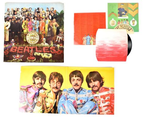 Sgt Pepper's Lonely Hearts Club Band, The Beatles first mono pressing, yellow Parlophone with flame inner and original cut-ou